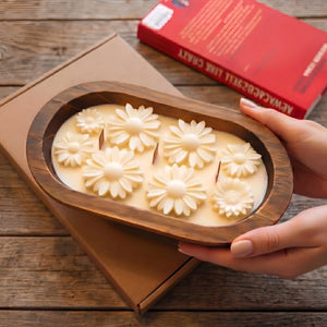 Daisy dough bowl candle in a home setting